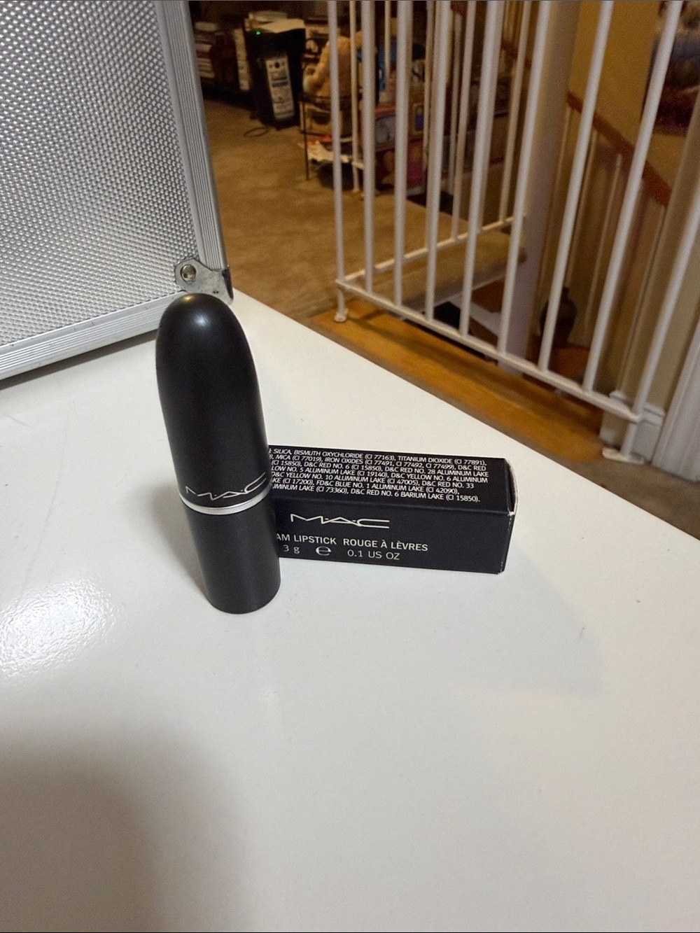 MAC Cosmetics Lipstick in Black Case color is Tangerine trees